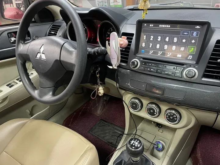 2012 Mitsubishi Lancer EX 1.8L 136HP L4 5MT,autocango,china used car exporter,china ev exporter,chinese used car exporter,chinese used ev exporter