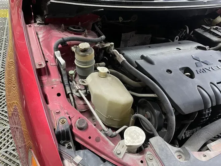 2012 Mitsubishi Lancer EX 1.8L 136HP L4 5MT,autocango,china used car exporter,china ev exporter,chinese used car exporter,chinese used ev exporter