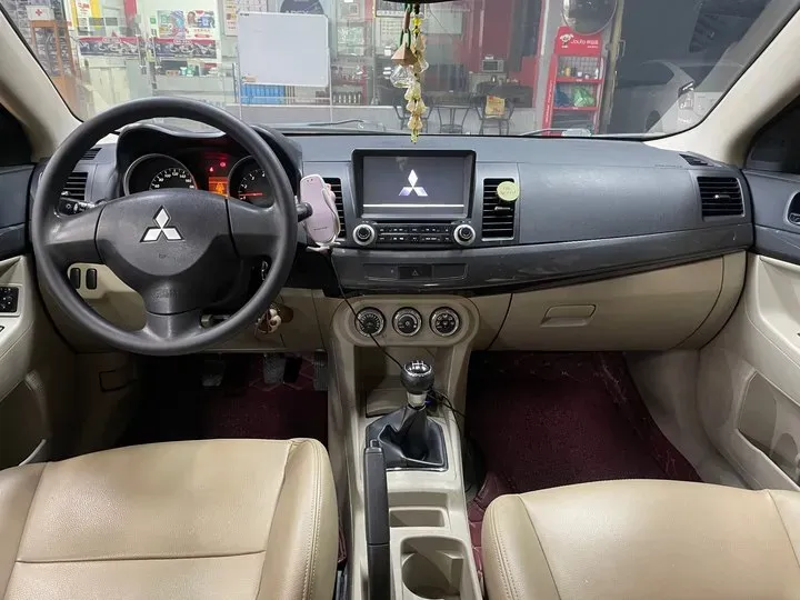 2012 Mitsubishi Lancer EX 1.8L 136HP L4 5MT,autocango,china used car exporter,china ev exporter,chinese used car exporter,chinese used ev exporter