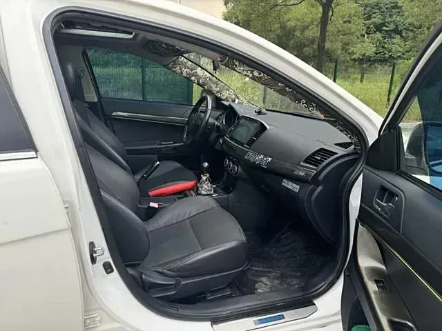 2012 Mitsubishi Lancer EX 1.8L 136HP L4 5MT,autocango,china used car exporter,china ev exporter,chinese used car exporter,chinese used ev exporter