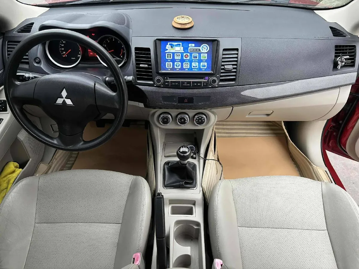 2012 Mitsubishi Lancer EX 1.8L 136HP L4 5MT,autocango,china used car exporter,china ev exporter,chinese used car exporter,chinese used ev exporter