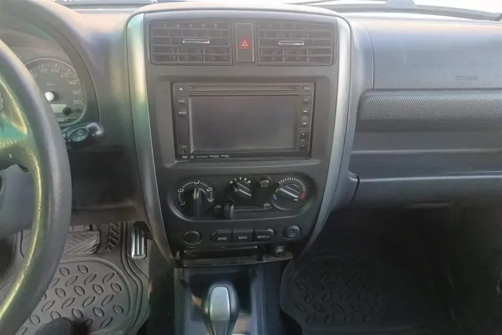 2011 Suzuki Jimny 1.3L 85HP L4 4AT,autocango,china used car exporter,china ev exporter,chinese used car exporter,chinese used ev exporter