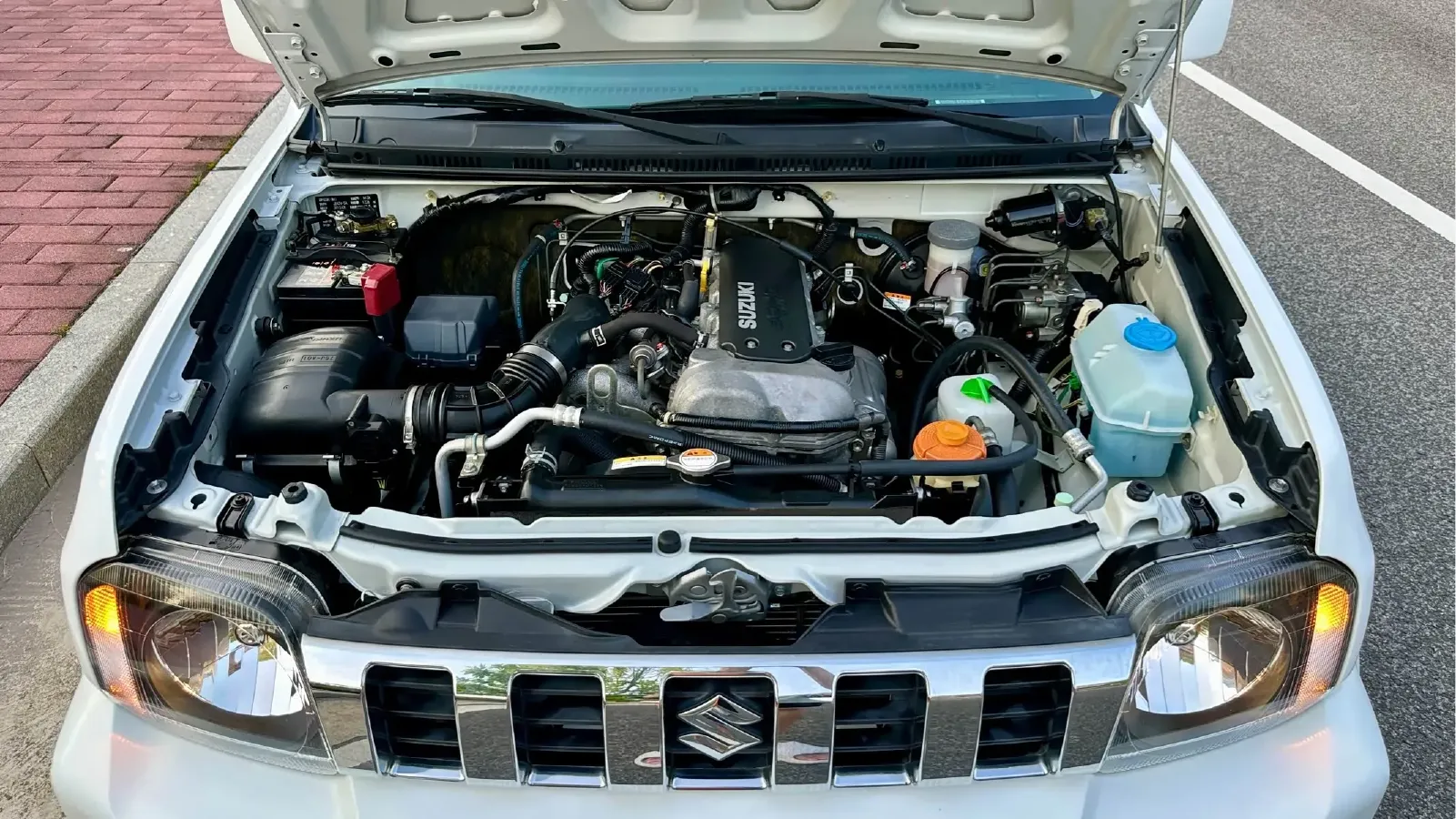 2012 Suzuki Jimny 1.3L 85HP L4 4AT,autocango,china used car exporter,china ev exporter,chinese used car exporter,chinese used ev exporter