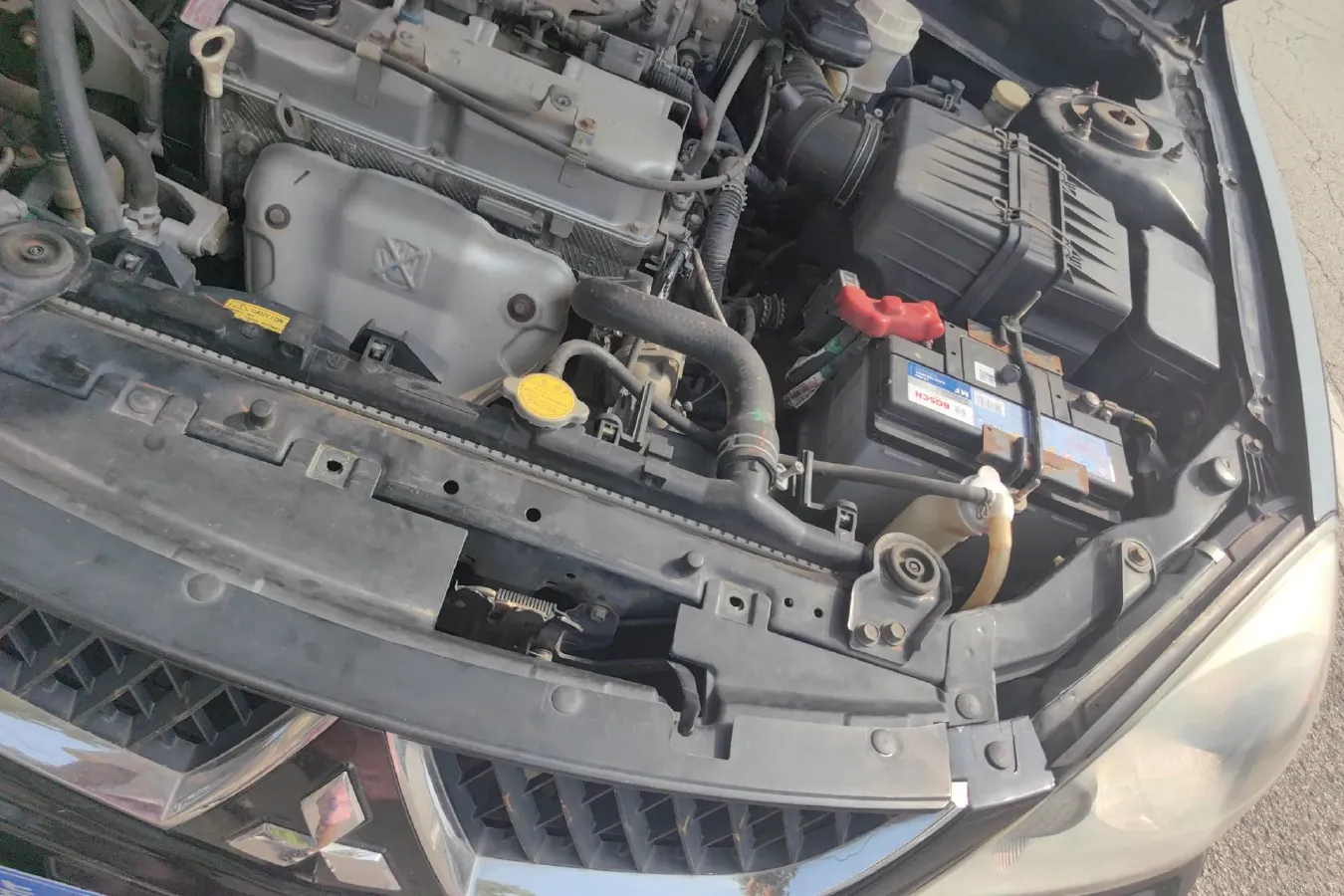 2010 Mitsubishi Lancer 1.6L 100HP L4 5MT,autocango,china used car exporter,china ev exporter,chinese used car exporter,chinese used ev exporter