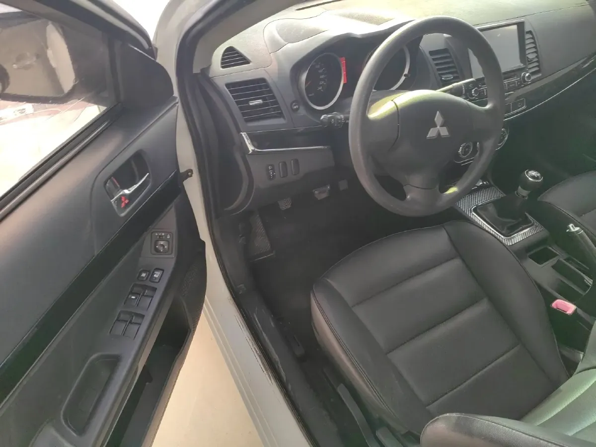 2013 Mitsubishi Lancer EX 1.6L 113HP L4 5MT,autocango,china used car exporter,china ev exporter,chinese used car exporter,chinese used ev exporter