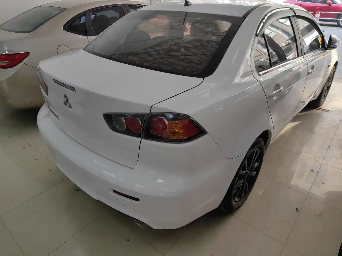 2013 Mitsubishi Lancer EX 1.6L 113HP L4 5MT,autocango,china used car exporter,china ev exporter,chinese used car exporter,chinese used ev exporter