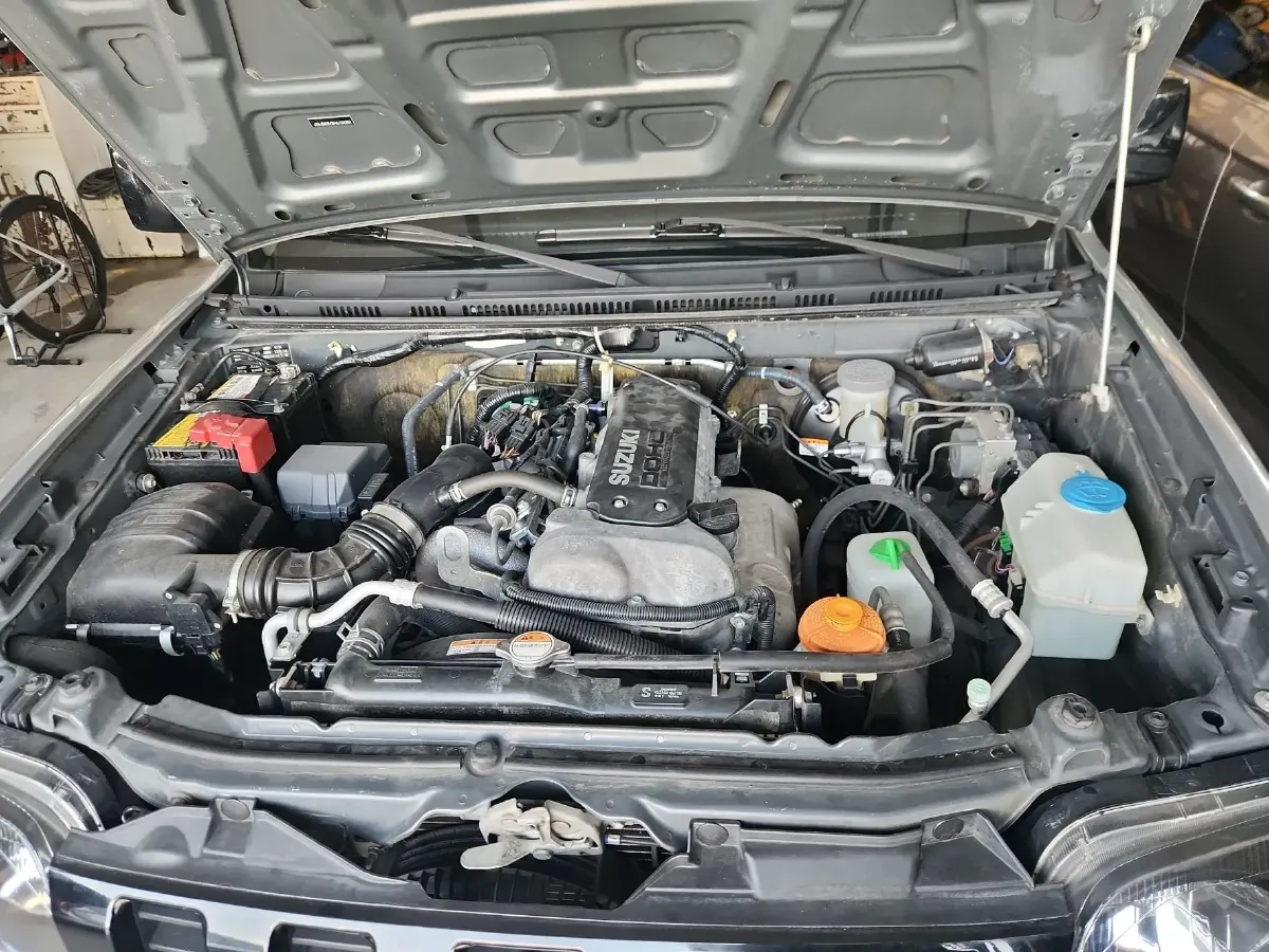 2015 Suzuki Jimny 1.3L 85HP L4 4AT,autocango,china used car exporter,china ev exporter,chinese used car exporter,chinese used ev exporter