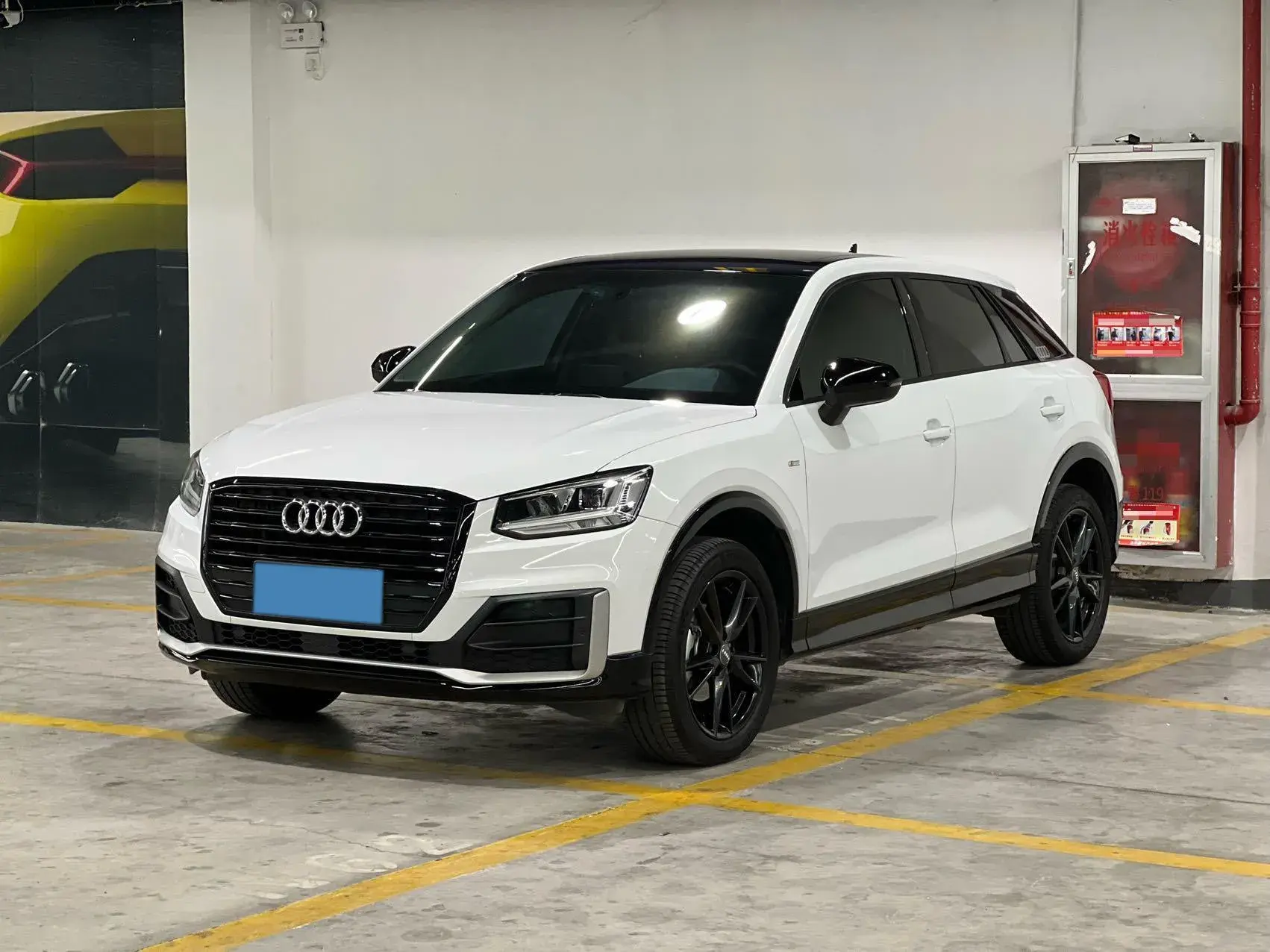 2021 AUDI Q2L view 1