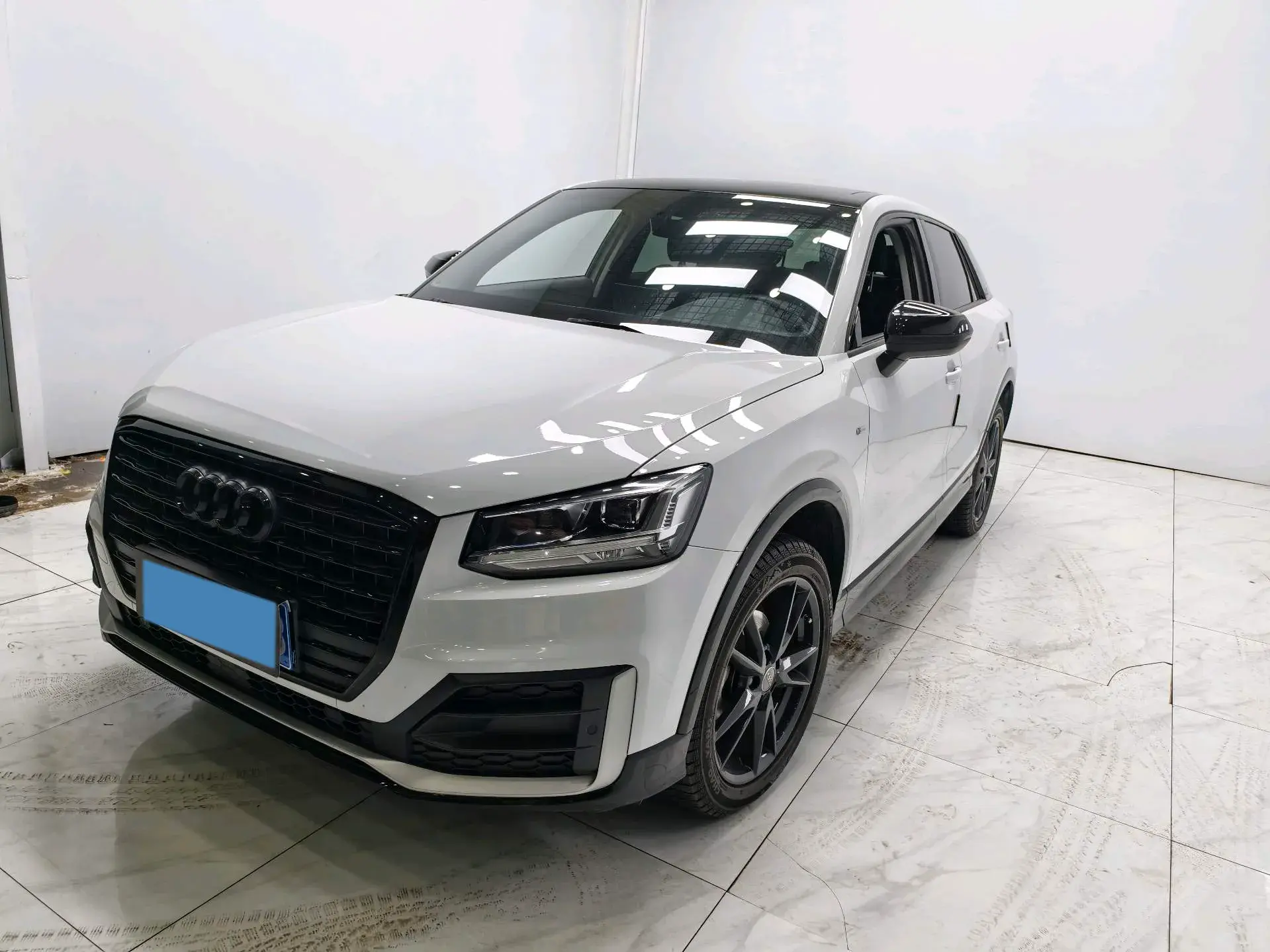 2021 AUDI Q2L view 1