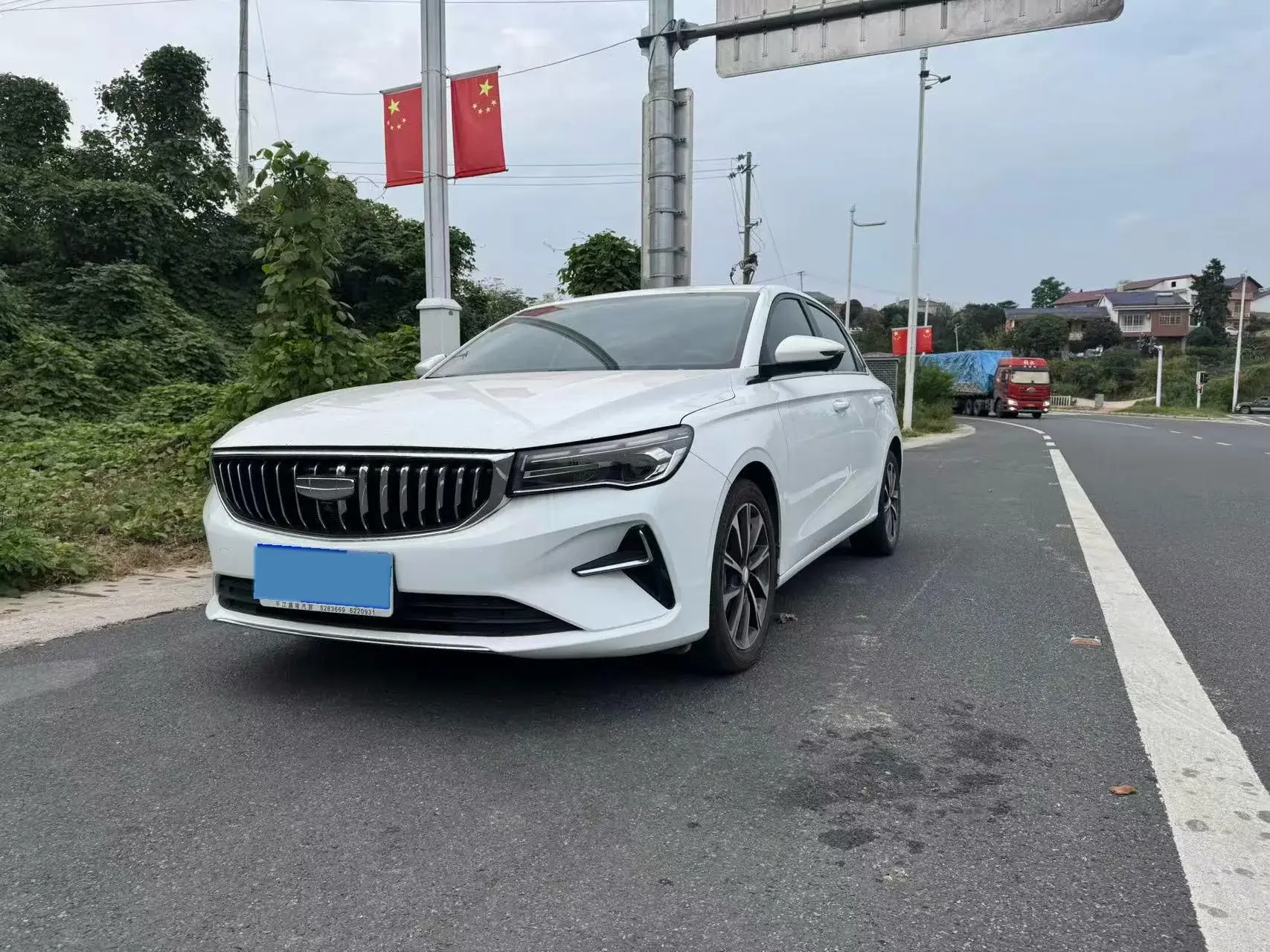 2025 GEELY EMGRAND view 1