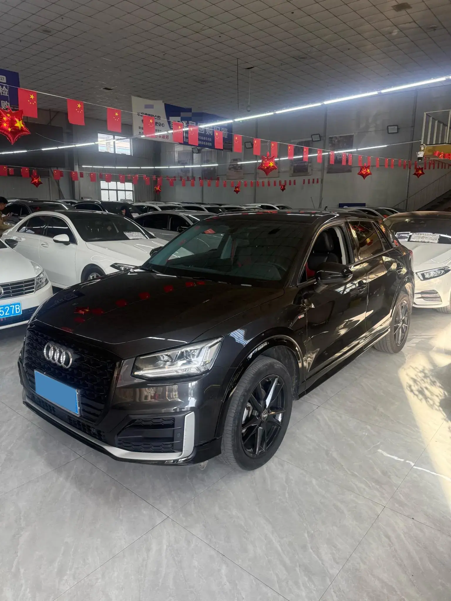 2021 AUDI Q2L view 1