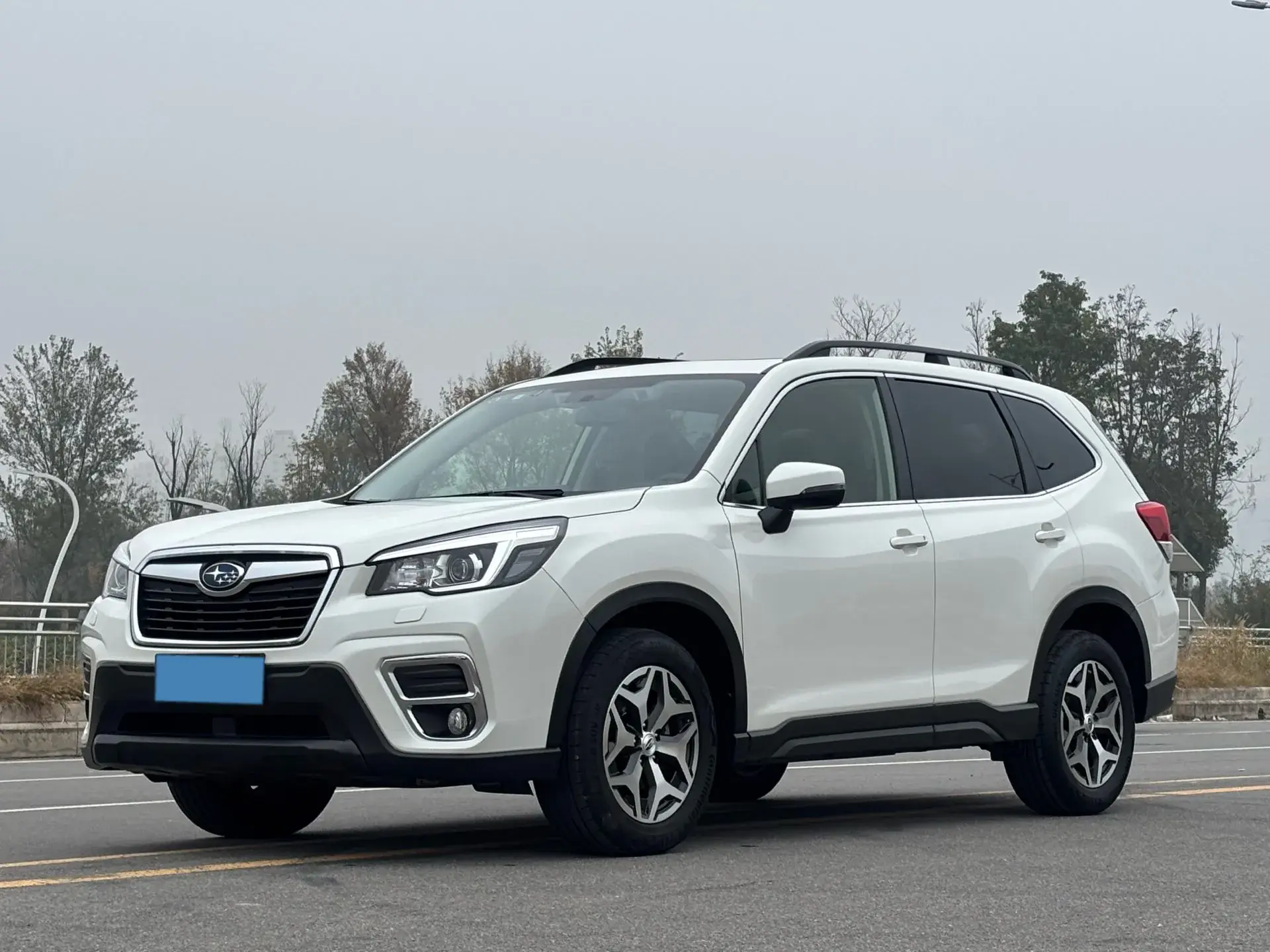 2021 SUBARU FORESTER view 1