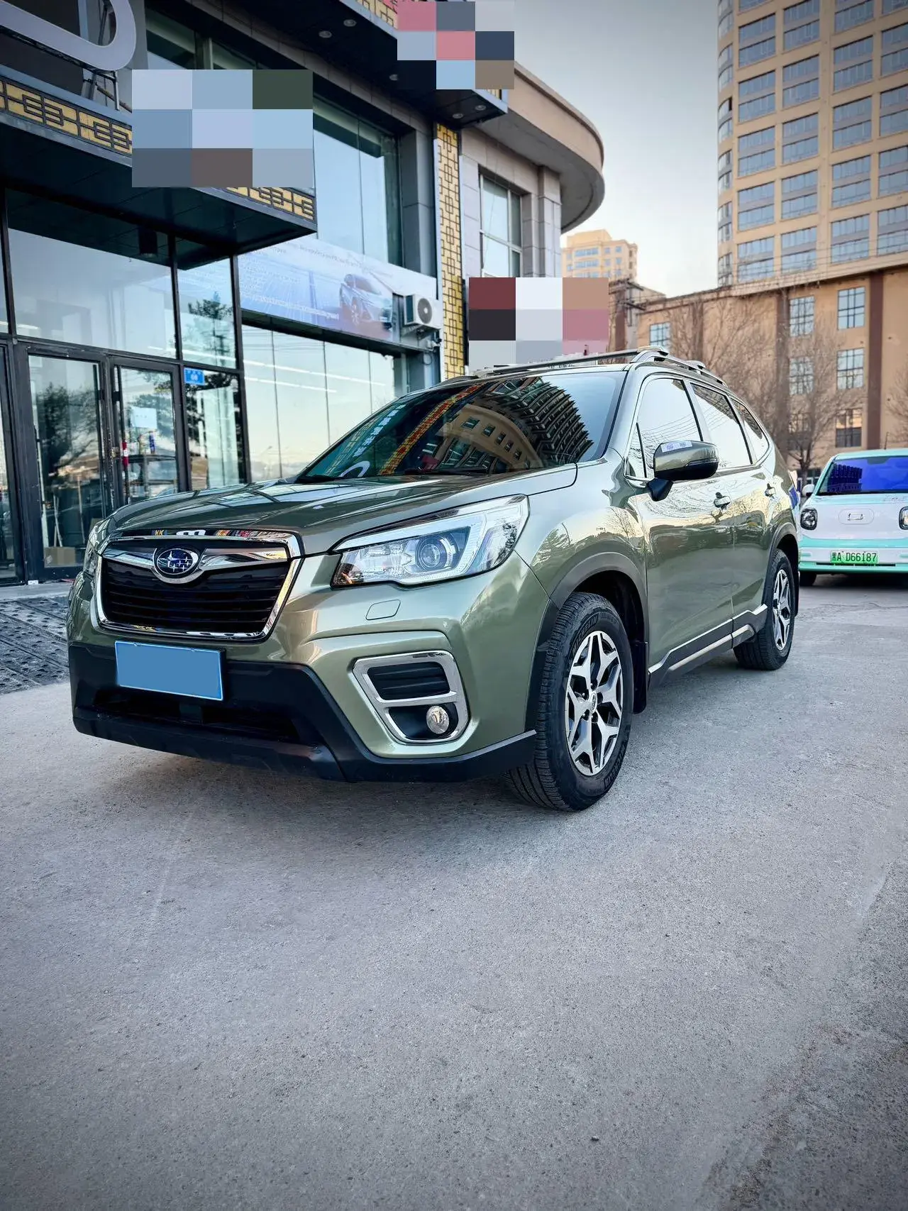 2021 SUBARU FORESTER view 1