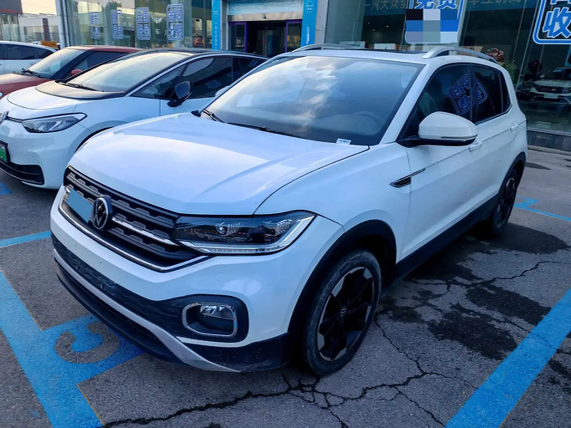 2021 VOLKSWAGEN TACQUA view 1