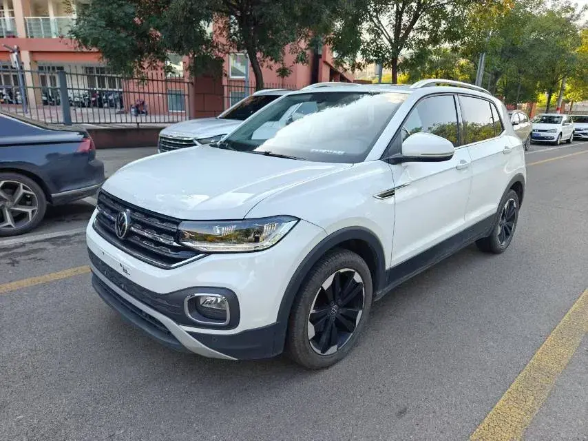 2021 VOLKSWAGEN TACQUA view 1