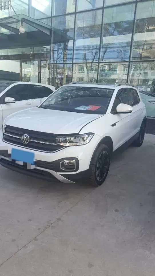 2021 VOLKSWAGEN TACQUA view 1