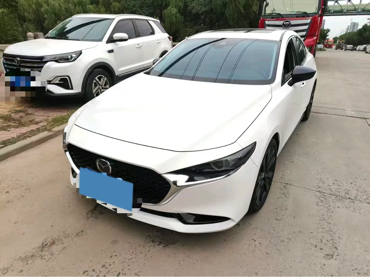 2023 MAZDA 3 view 1