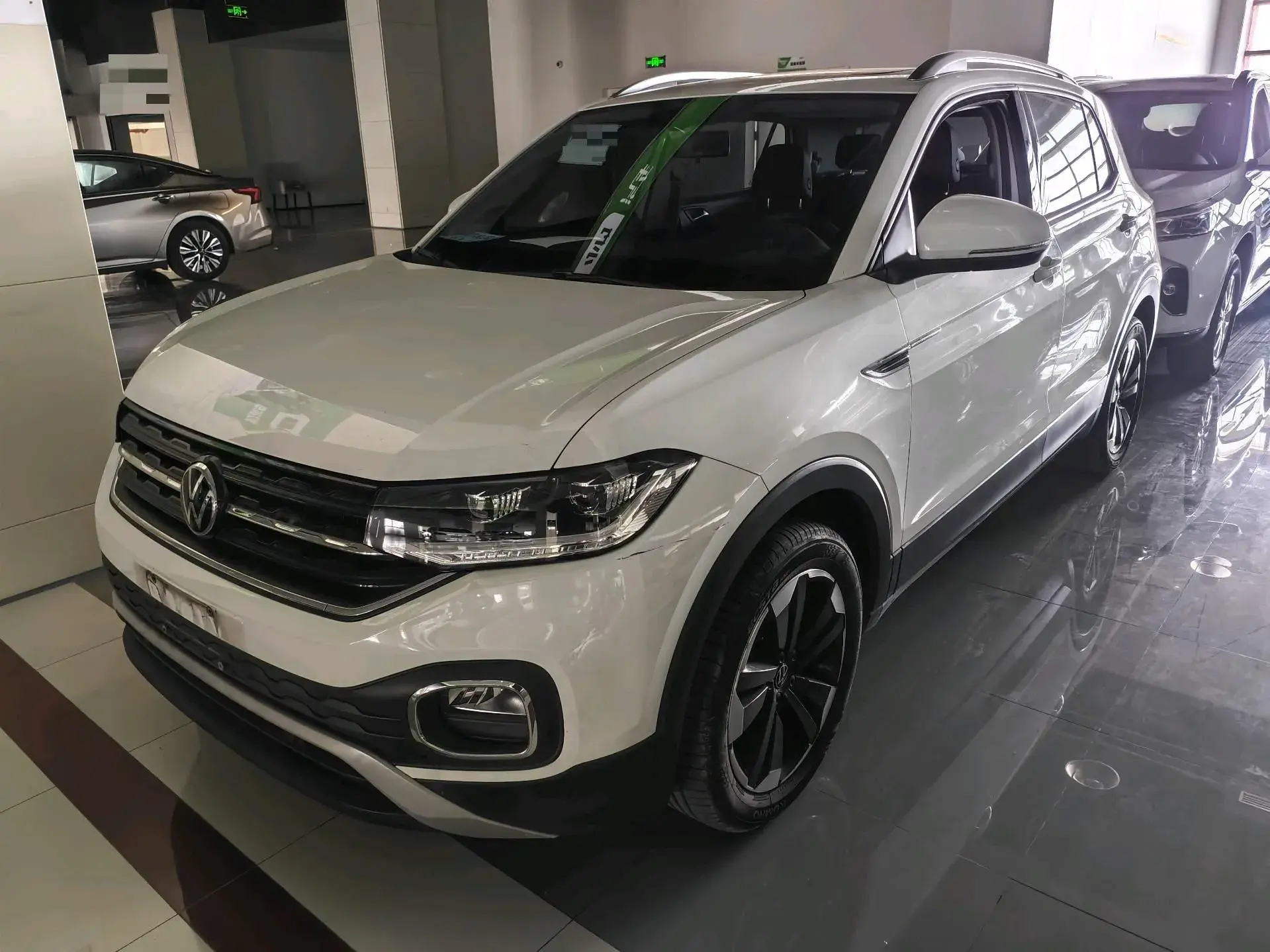 2021 VOLKSWAGEN TACQUA view 1