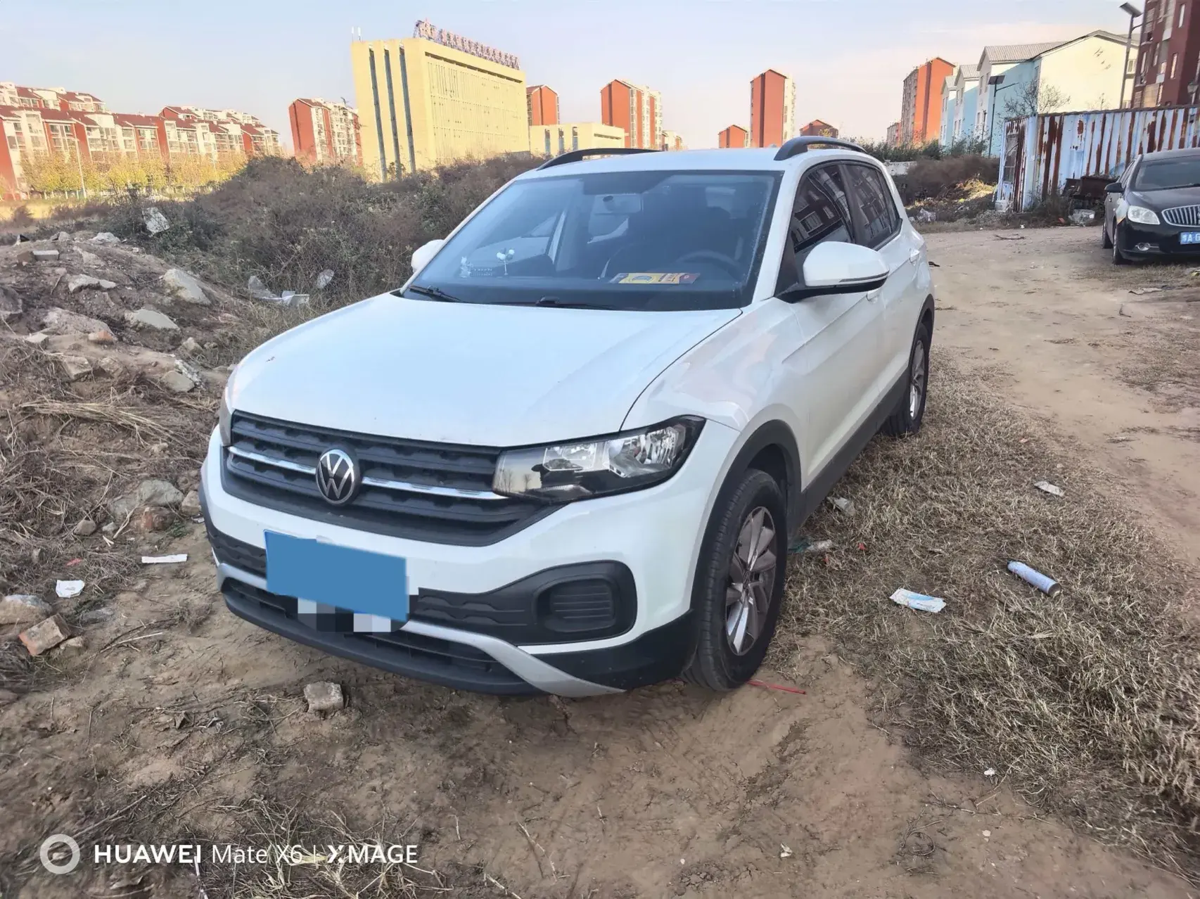 2021 VOLKSWAGEN TACQUA view 1