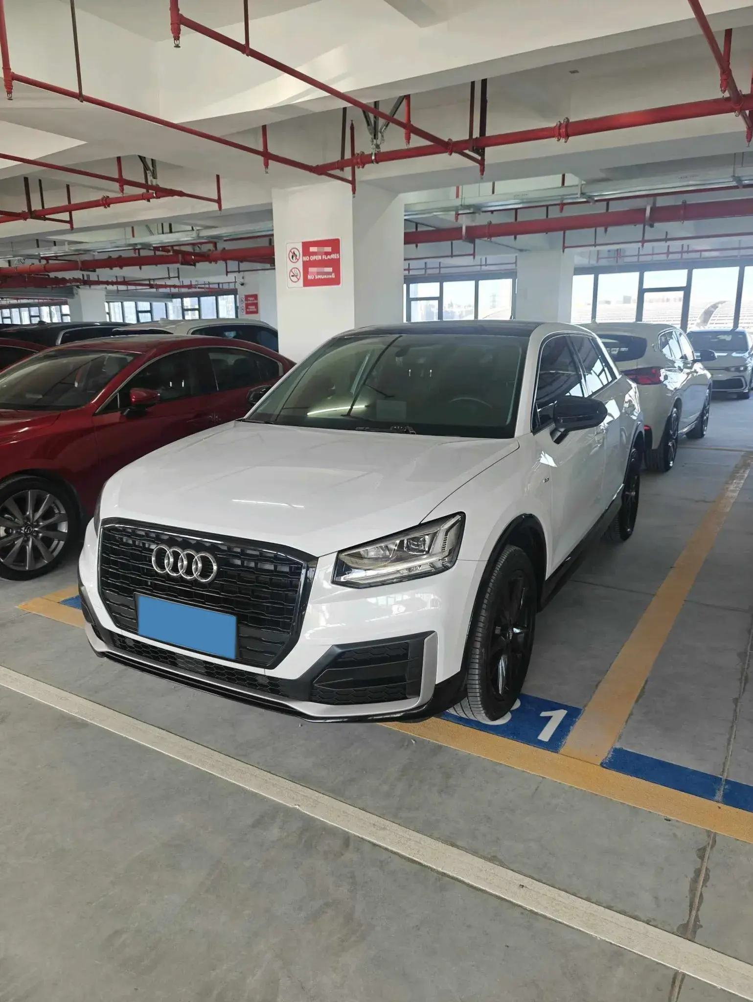 2021 AUDI Q2L view 1