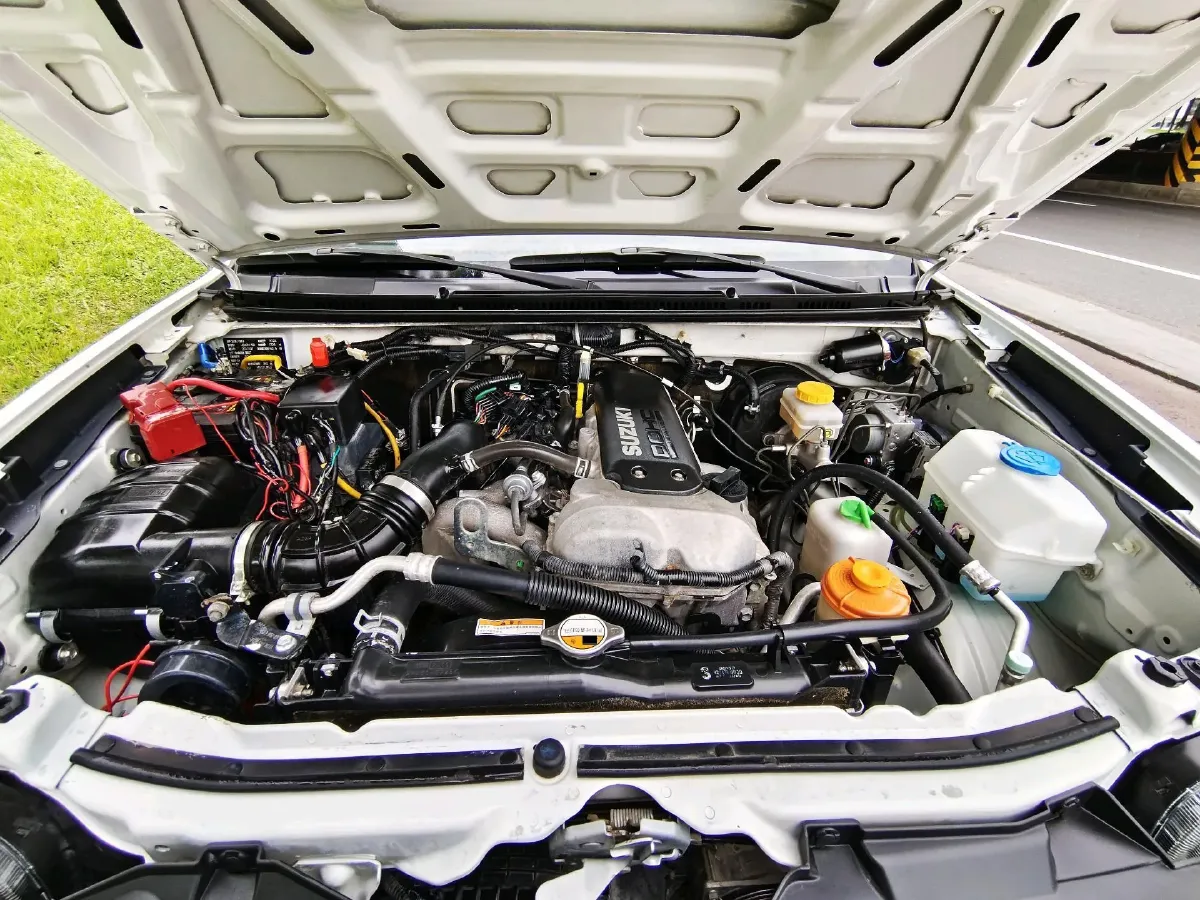 2015 Suzuki Jimny 1.3L 85HP L4 4AT,autocango,china used car exporter,china ev exporter,chinese used car exporter,chinese used ev exporter