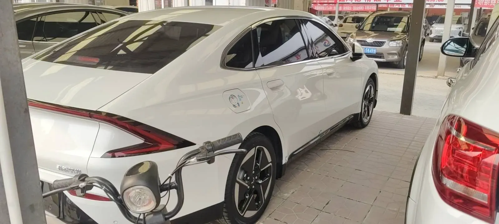 2025 BaoJun XiangJing 1.5T 143HP L4 1DHT PHEV,autocango,china used car exporter,china ev exporter,chinese used car exporter,chinese used ev exporter