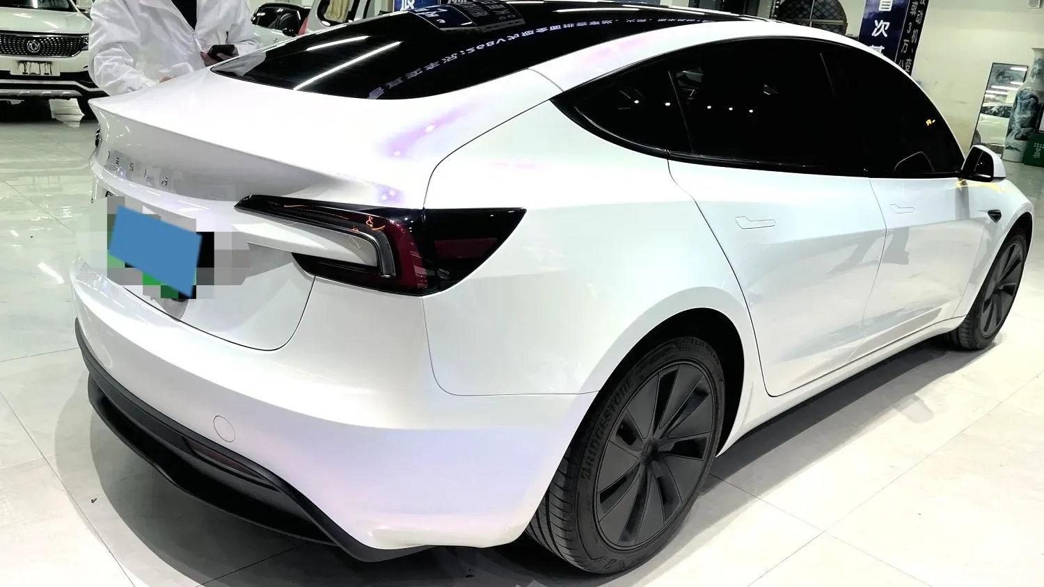 2025 Tesla Model 3 BEV 62.5KWH,autocango,china used car exporter,china ev exporter,chinese used car exporter,chinese used ev exporter
