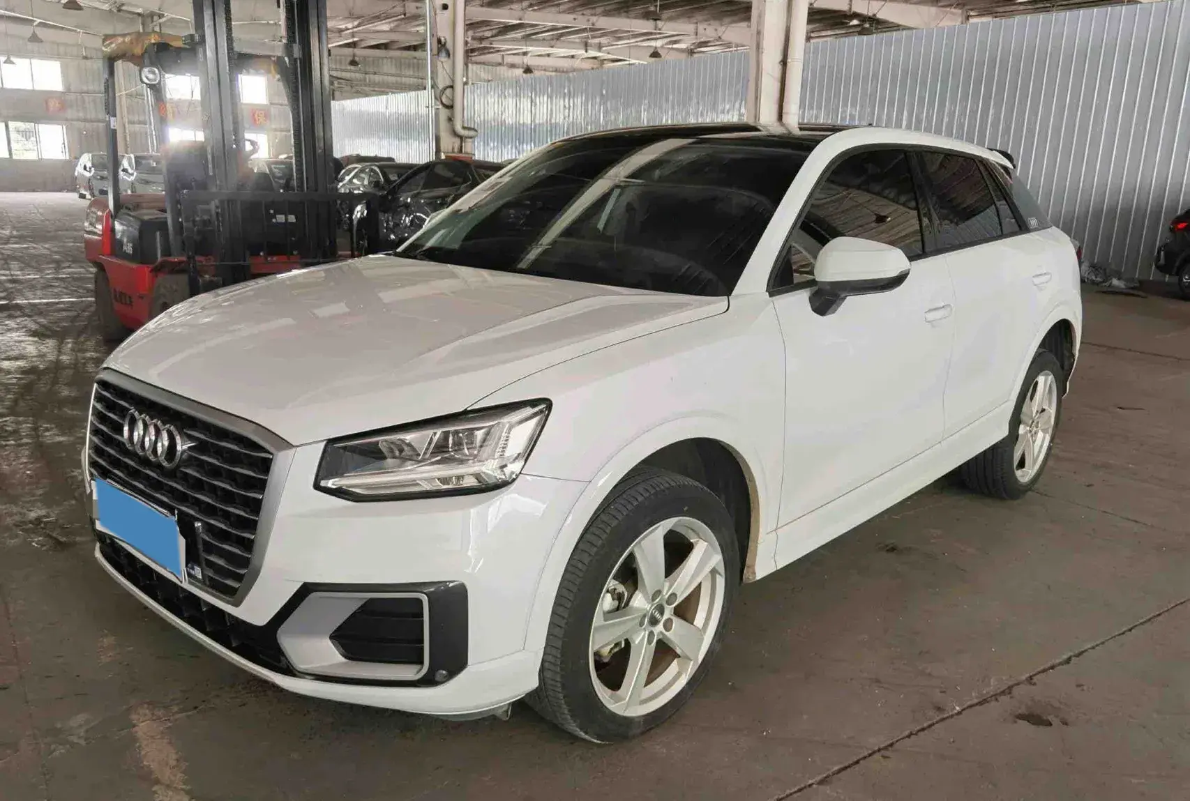 2021 AUDI Q2L view 1