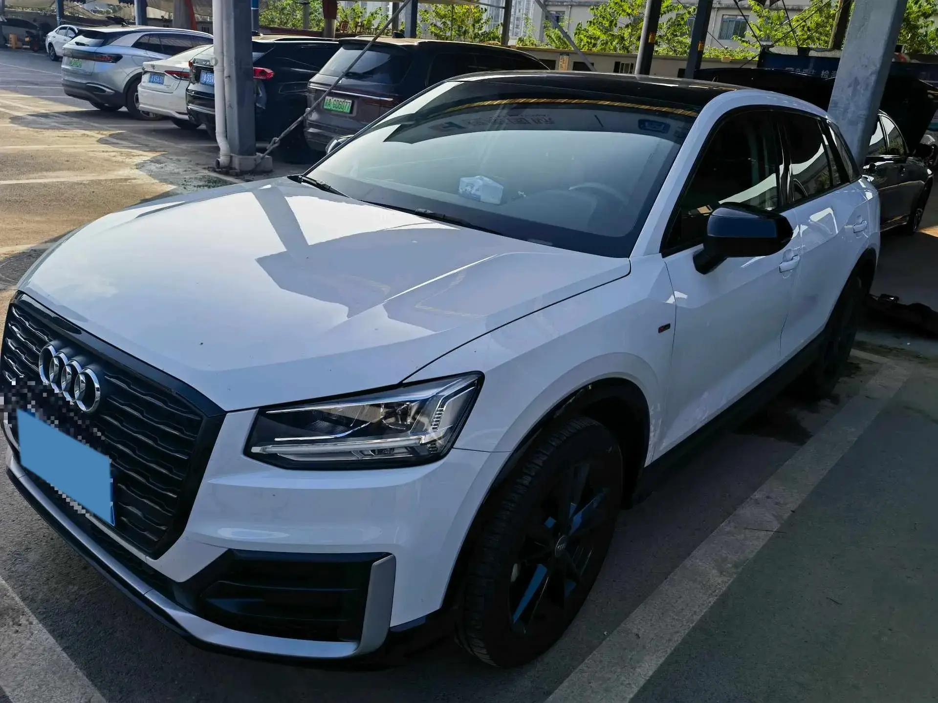 2021 AUDI Q2L view 1