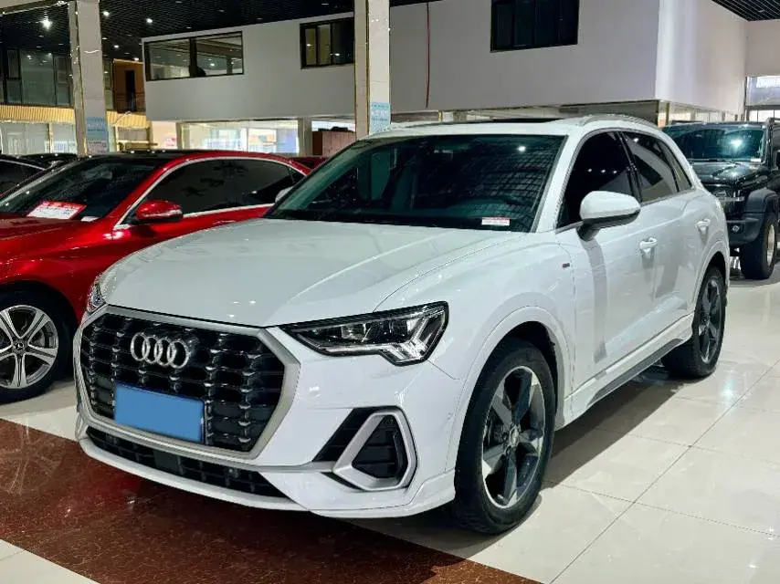 2023 AUDI Q2L view 1