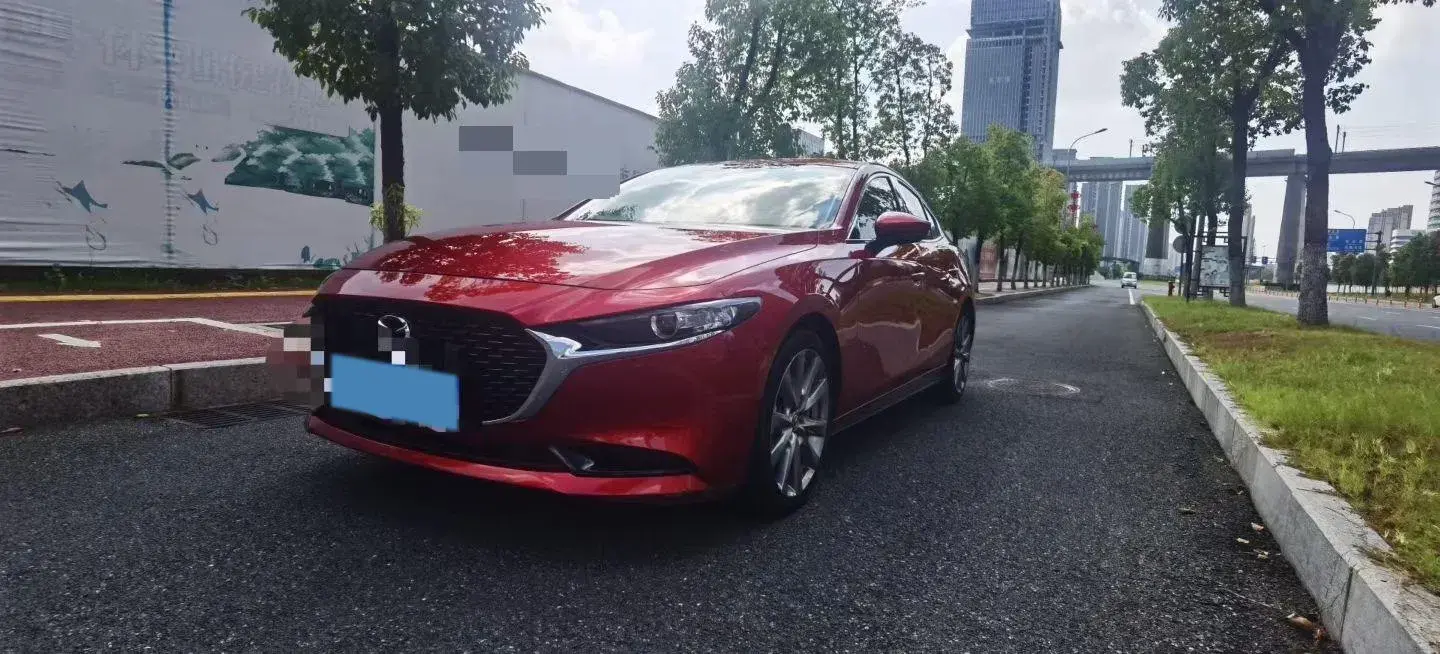 2021 MAZDA 3 view 1