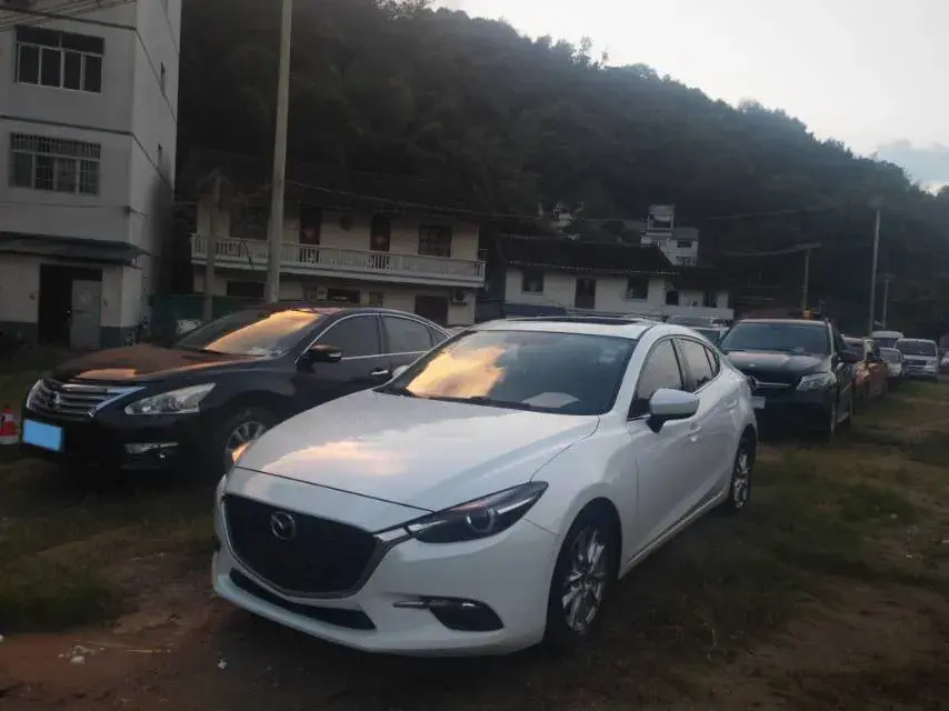 2017 MAZDA 3 view 1